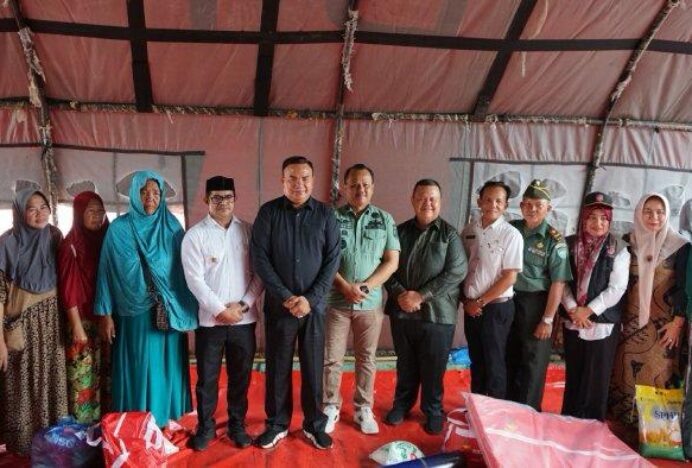 Pj Bupati Agara Serahkan Bantuan Korban Kebakaran di Kecamatan Lawe Sigala-gala