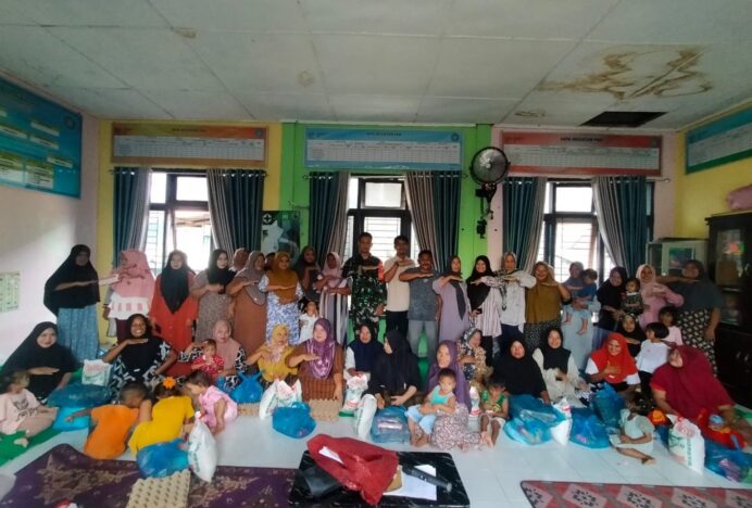 Babinsa Koramil Mesjid Raya Hadiri Penyerahan Bantuan Makanan Tambahan untuk Balita Stunting di Meunasah Keudee