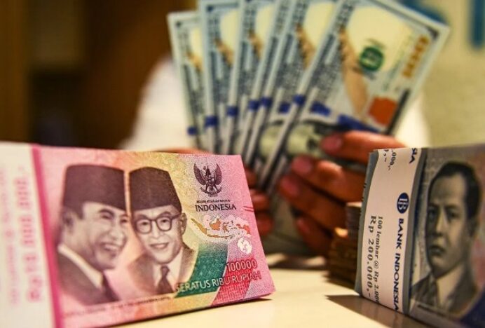 BI Pangkas Suku Bunga, Rupiah Tutup Perdagangan di Rp16.437 per Dolar