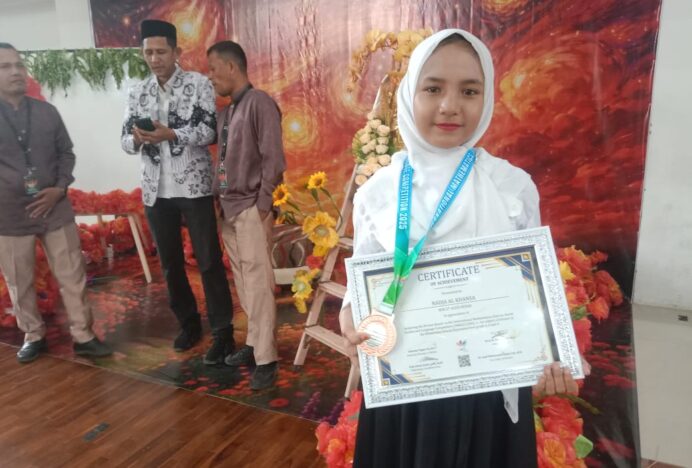 Nadja Dirijen Cilik Berprestasi Asal MIN 27 Aceh Besar