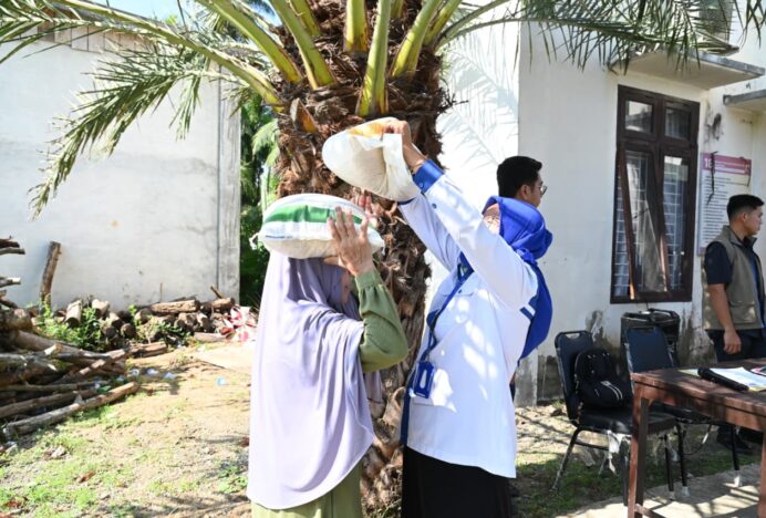 Penyaluran Bantuan Pangan Beras dan Minyak Goreng