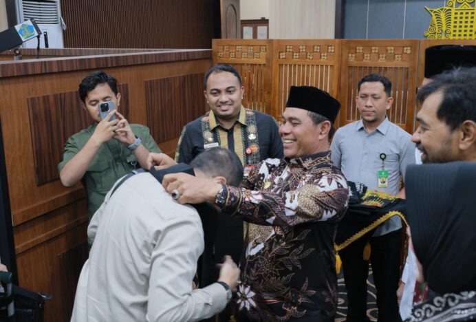 Bupati Aceh Besar Sambut Kunjungan Kerja Badan Legislasi DPR RI di Bandara SIM