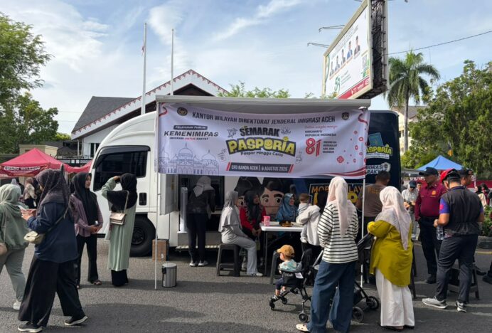 Olahraga Sambil Urus Paspor, Pasporia Imigrasi Banda Aceh Layani 11 Warga di CFD